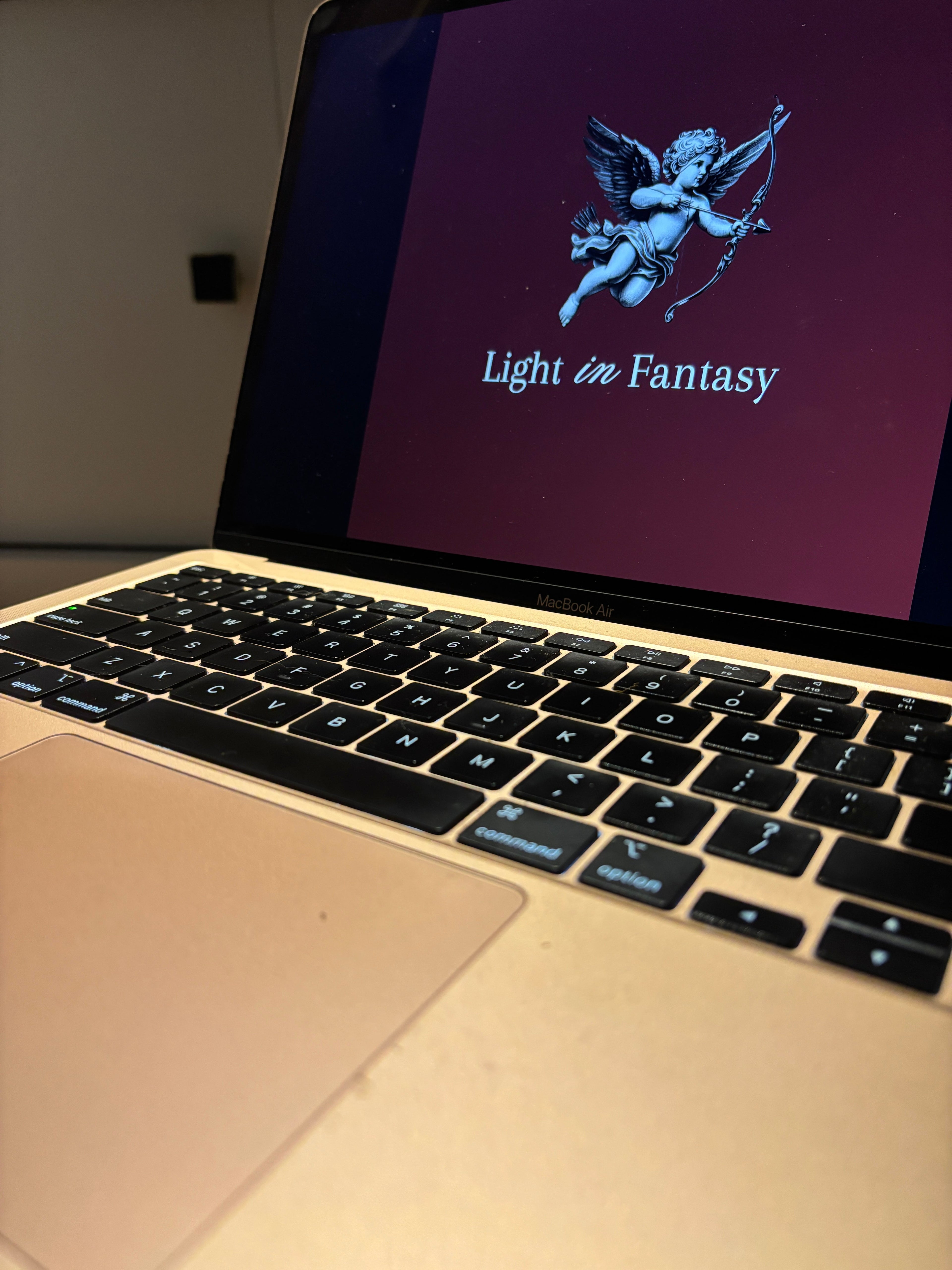 laptop and light in fantasy logo , kept on carpet